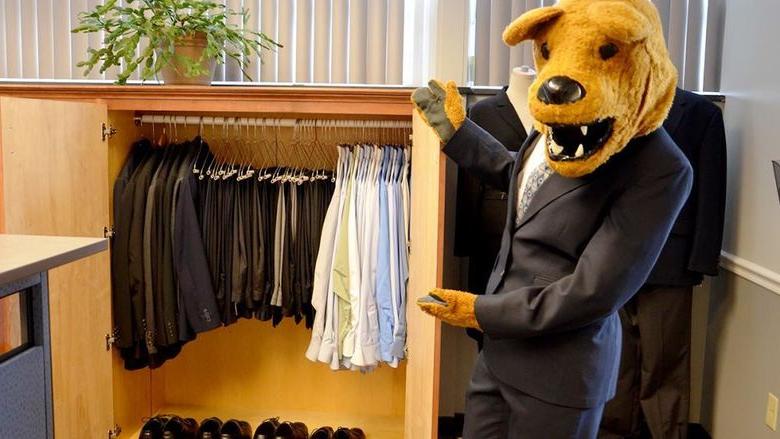 The Nittany Lion shows off the Penn State Altoona Career Closet